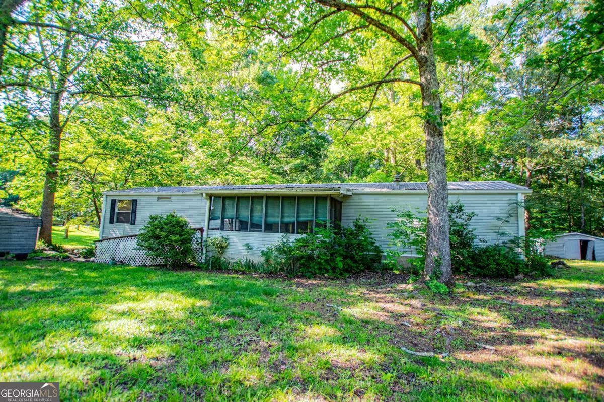 3 bedroom, 2 bathroom, 980 sq ft manufactured home,single family residence sold at 698 Goolsby Road, Carrollton, GA 30117
