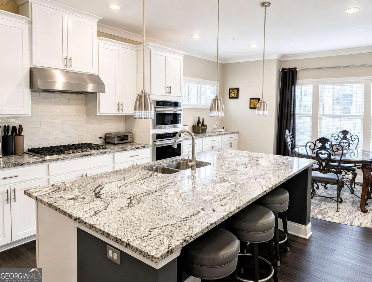 4 bedroom, 3.5 bathroom, 2,447 sq ft townhouse for sale at 144 Boxcar Way, Smyrna, GA 30080 — photo 2