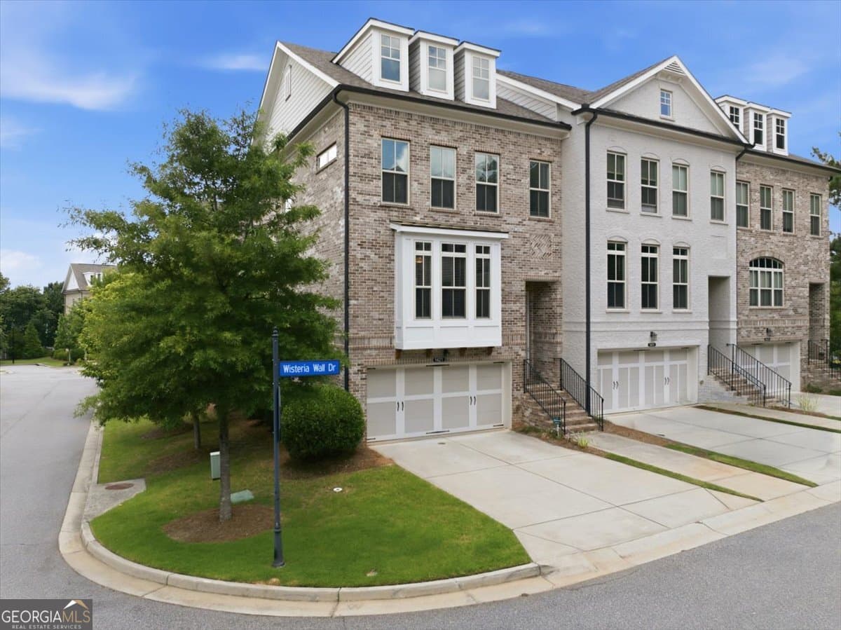 4 bedroom, 3.5 bathroom townhouse for sale at 1421 Wisteria Wall Drive, Suwanee, GA 30024 — photo 2