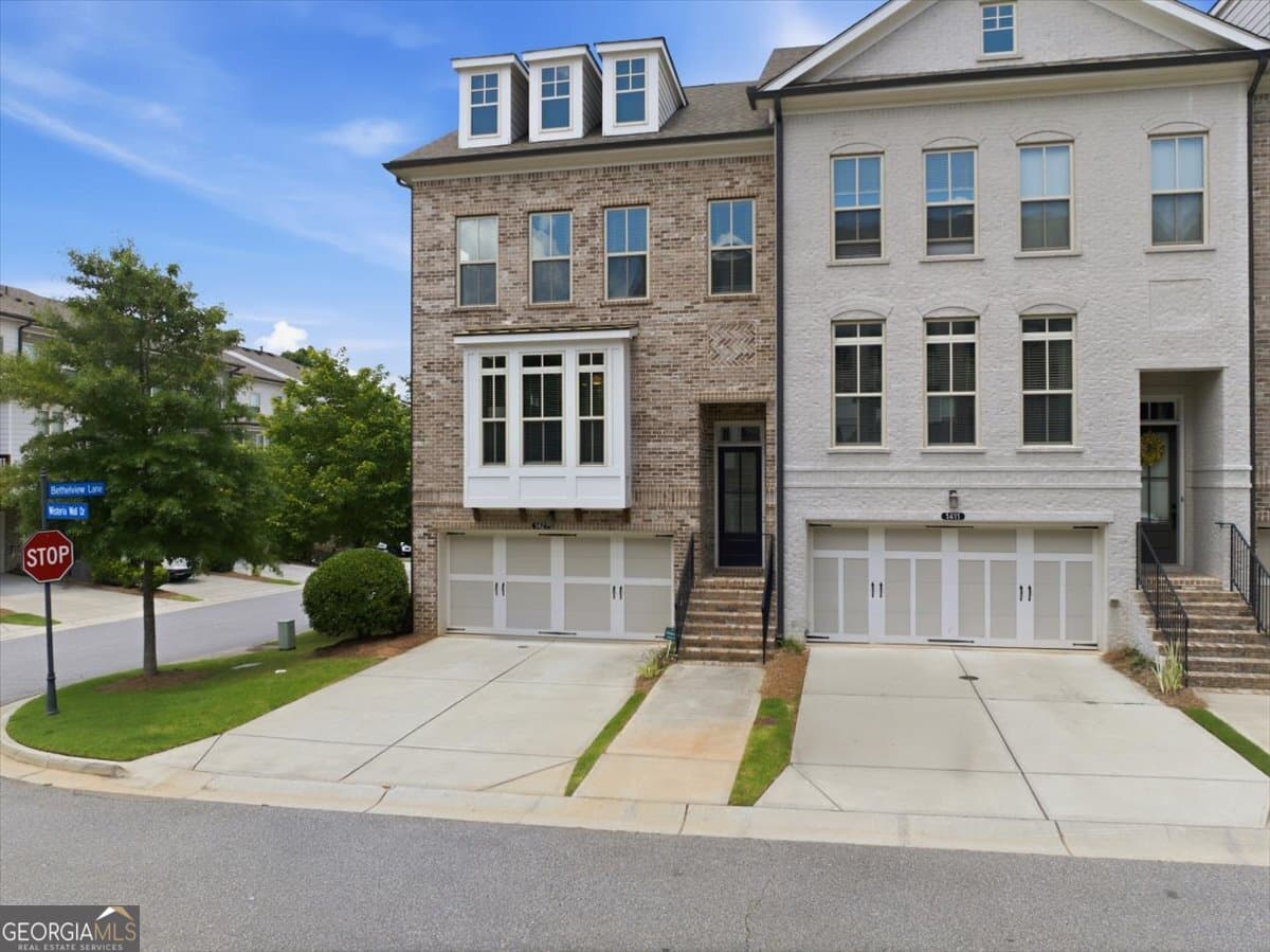 4 bedroom, 3.5 bathroom townhouse for sale at 1421 Wisteria Wall Drive, Suwanee, GA 30024 — photo 3
