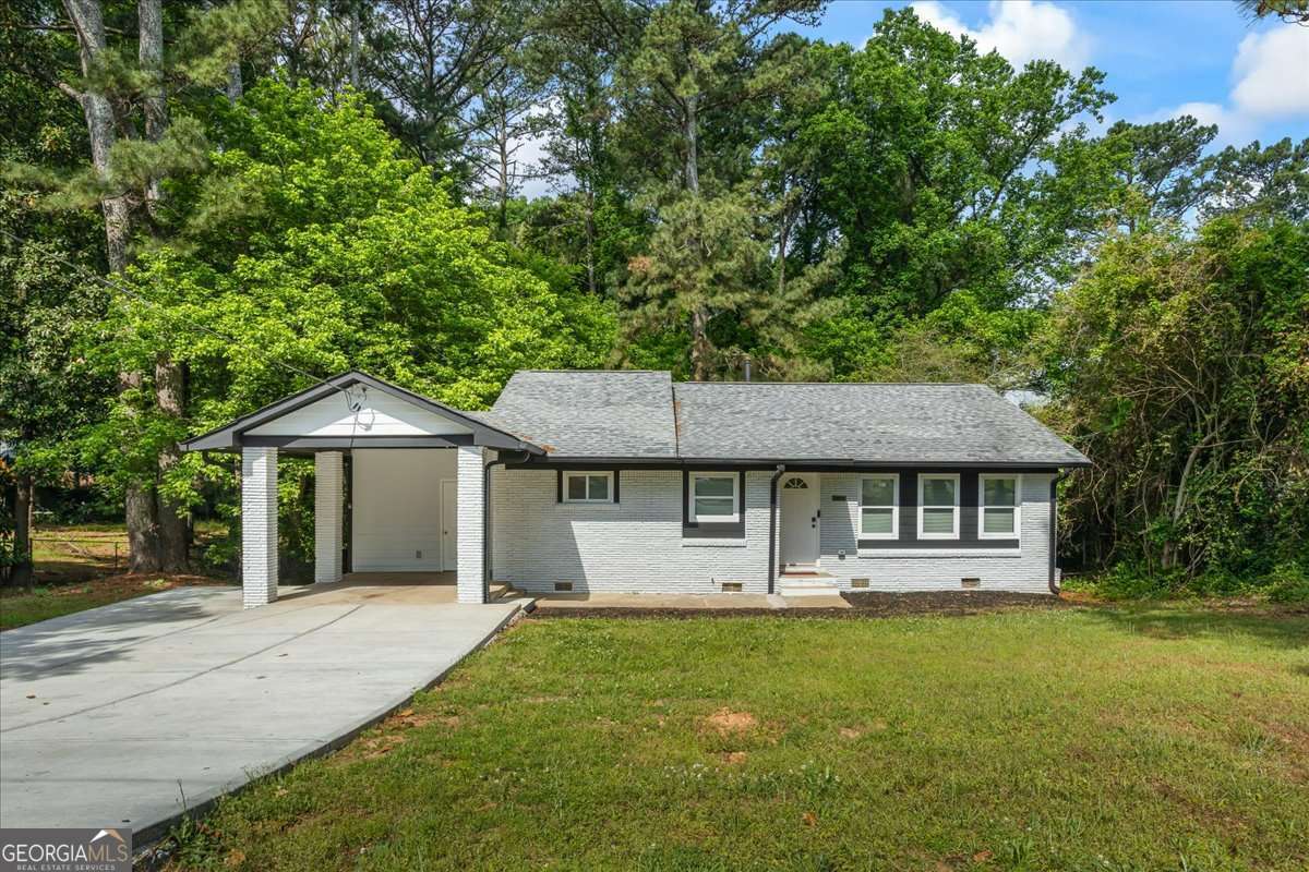 5 bedroom, 2.5 bathroom, 1,742 sq ft single family residence for sale at 2223 Columbia Drive, Decatur, GA 30032 — photo 2