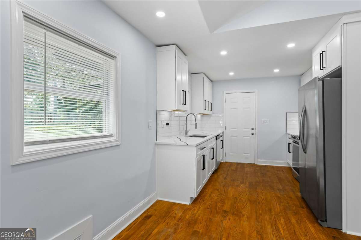 5 bedroom, 2.5 bathroom, 1,742 sq ft single family residence for sale at 2223 Columbia Drive, Decatur, GA 30032 — photo 9