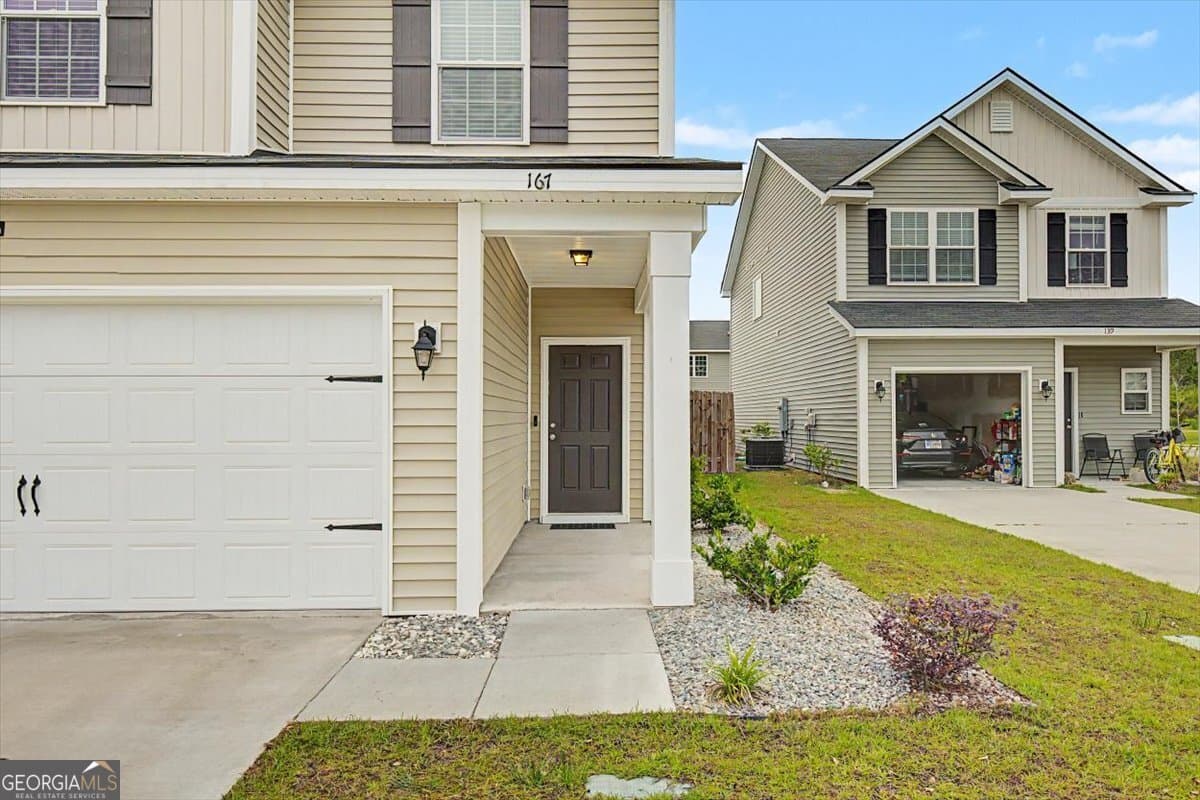 4 bedroom, 2.5 bathroom, 1,950 sq ft single family residence for sale at 167 Courage Way, Hinesville, GA 31313 — photo 2