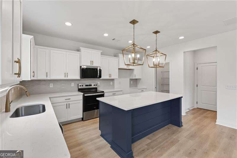 4 bedroom, 2.5 bathroom, 2,228 sq ft single family residence for sale at 12 CORETTA Court, Winder, GA 30680 — photo 8
