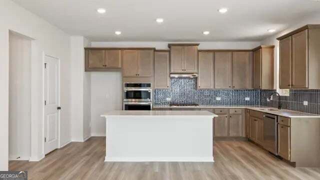 5 bedroom, 4 bathroom, 3,072 sq ft single family residence for sale at 3975 Silver Pine Trail, Cumming, GA 30028 — photo 6