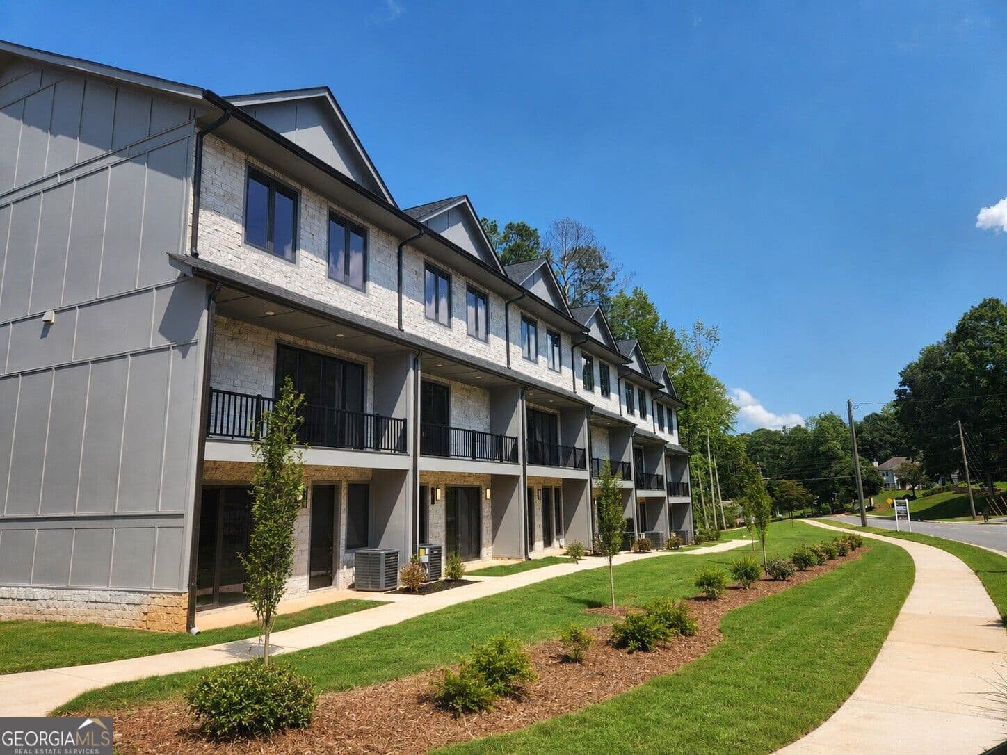 3 bedroom, 3.5 bathroom, 2,441 sq ft townhouse for sale at 3565 Chelsea Falls Way, Suwanee, GA 30024 — photo 1 of 18