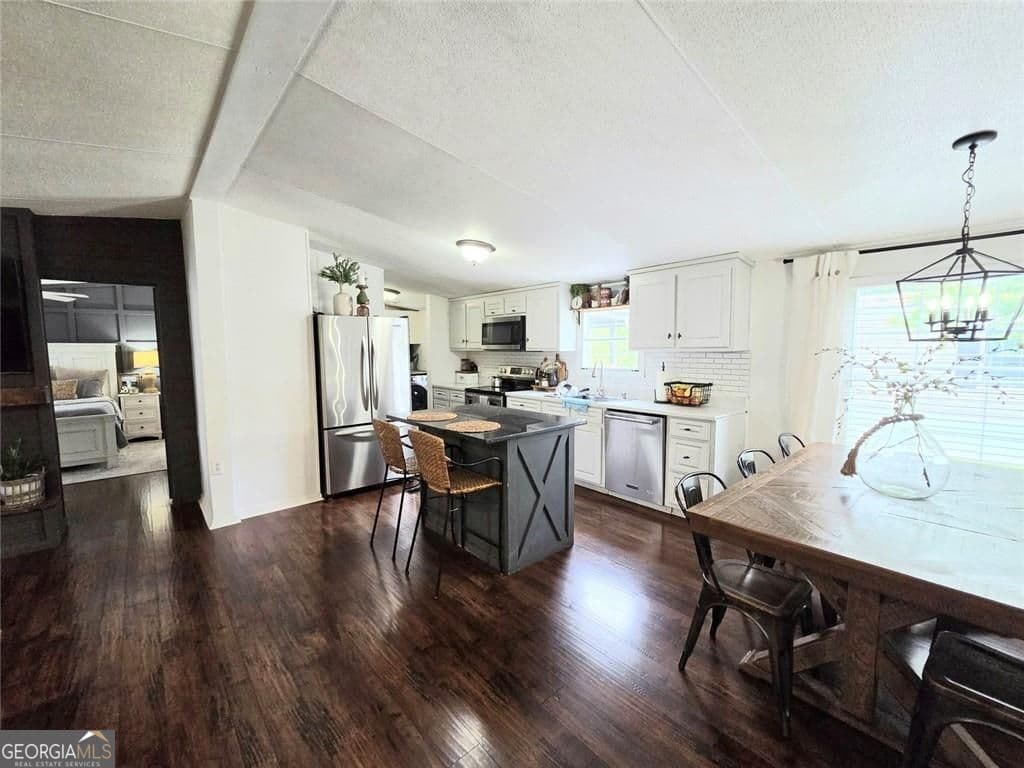3 bedroom, 2 bathroom, 1,152 sq ft manufactured home,single family residence for sale at 4855 Peachtree Drive, Buford, GA 30518 — photo 7