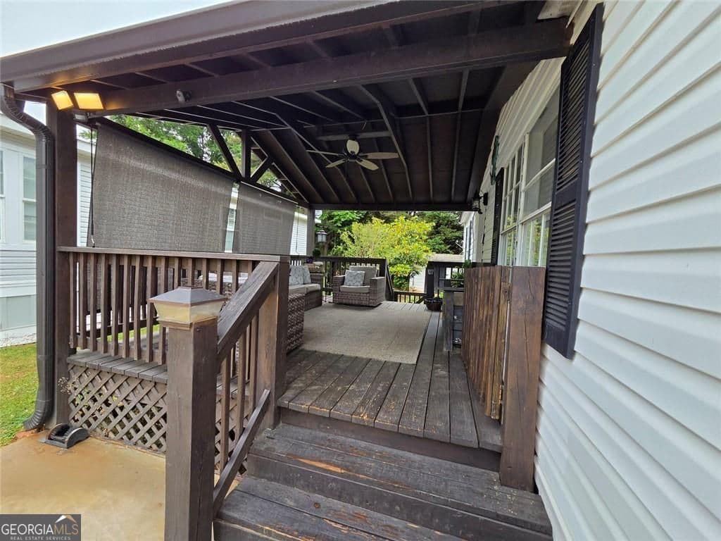 3 bedroom, 2 bathroom, 1,152 sq ft manufactured home,single family residence for sale at 4855 Peachtree Drive, Buford, GA 30518 — photo 3