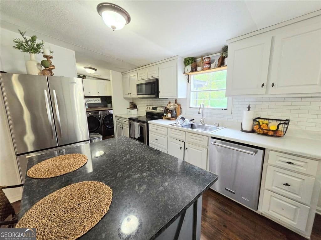 3 bedroom, 2 bathroom, 1,152 sq ft manufactured home,single family residence for sale at 4855 Peachtree Drive, Buford, GA 30518 — photo 9