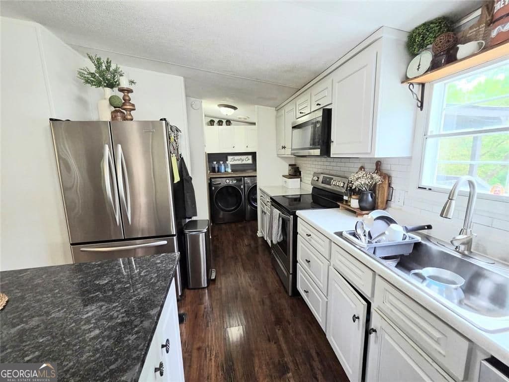 3 bedroom, 2 bathroom, 1,152 sq ft manufactured home,single family residence for sale at 4855 Peachtree Drive, Buford, GA 30518 — photo 10