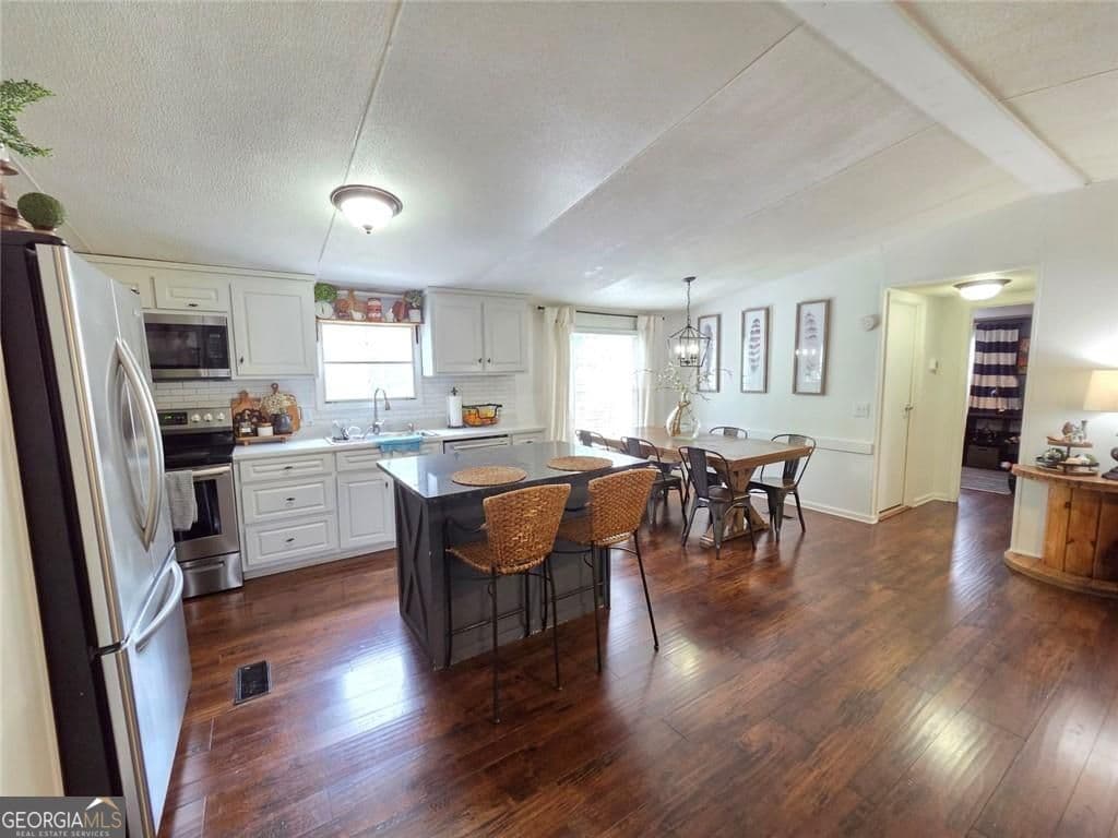3 bedroom, 2 bathroom, 1,152 sq ft manufactured home,single family residence for sale at 4855 Peachtree Drive, Buford, GA 30518 — photo 8