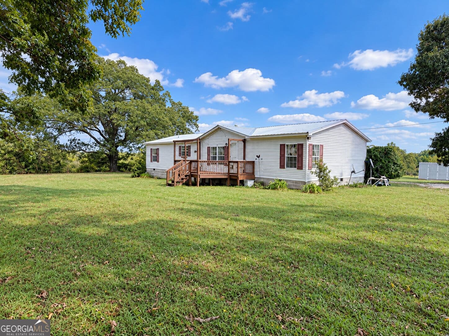 3 bedroom, 2 bathroom, 1,792 sq ft manufactured home,single family residence for sale at 3856 Ga Highway 231, Harrison, GA 31035 — photo 2
