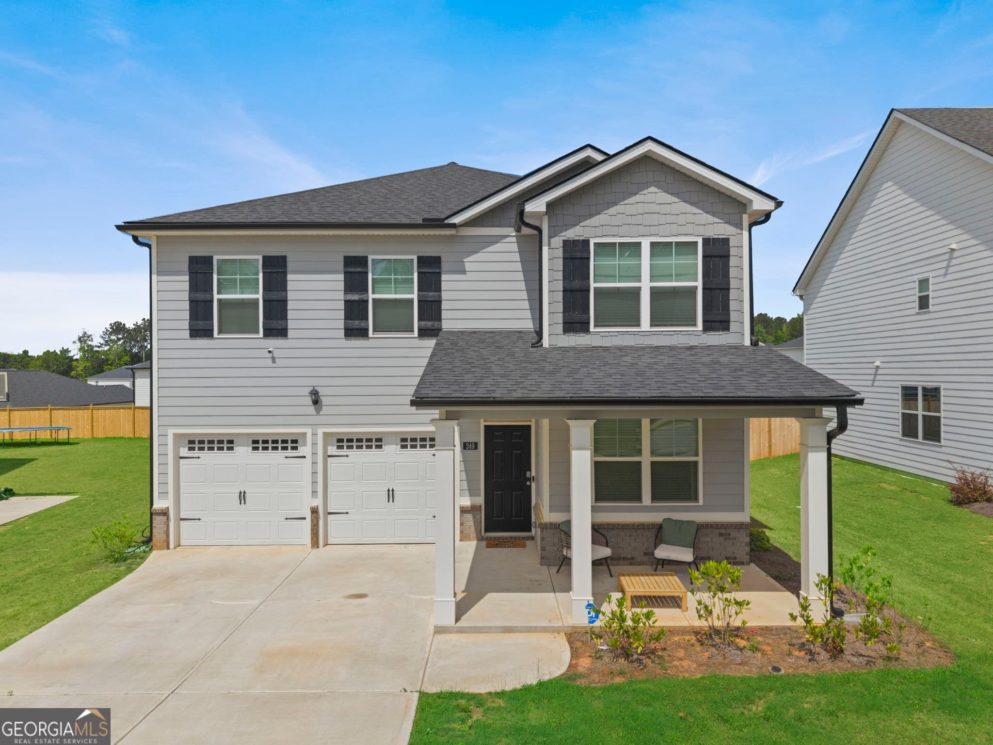 4 bedroom, 2.5 bathroom, 2,202 sq ft single family residence for sale at 249 Friendship Oak Way, Hampton, GA 30228 — photo 1 of 35