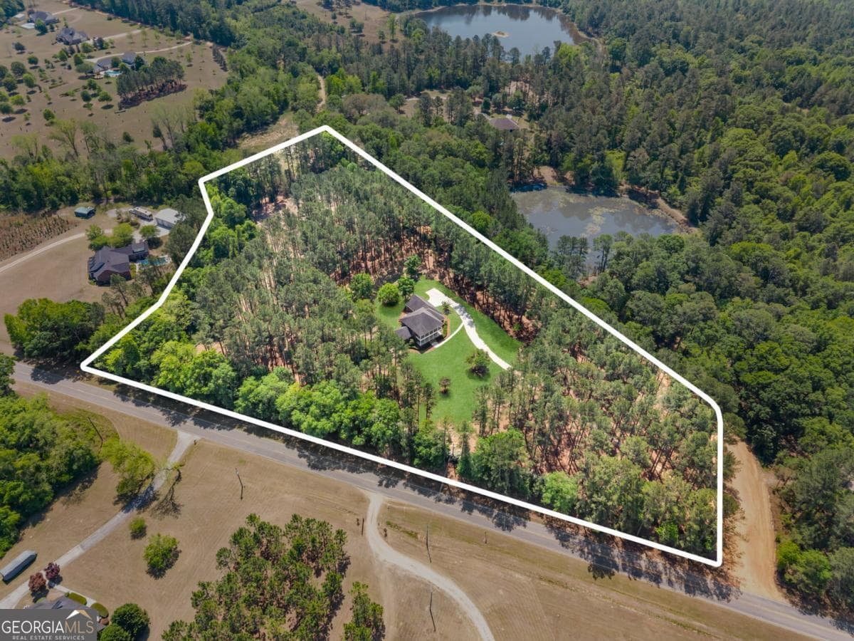 5 bedroom, 3.5 bathroom, 3,576 sq ft single family residence for sale at 392 Indigo Hills Road, Pembroke, GA 31321 — photo 2