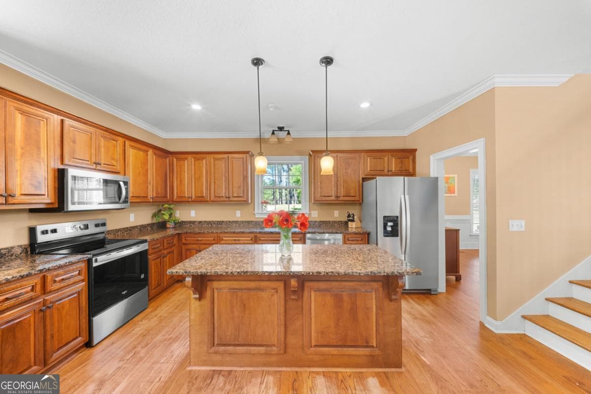 5 bedroom, 3.5 bathroom, 3,576 sq ft single family residence for sale at 392 Indigo Hills Road, Pembroke, GA 31321 — photo 4