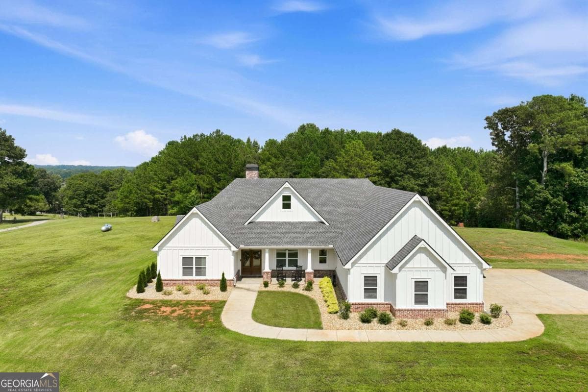 4 bedroom, 3.5 bathroom, 3,102 sq ft single family residence for sale at 5631 Sandy Creek Road, Madison, GA 30650 — photo 7