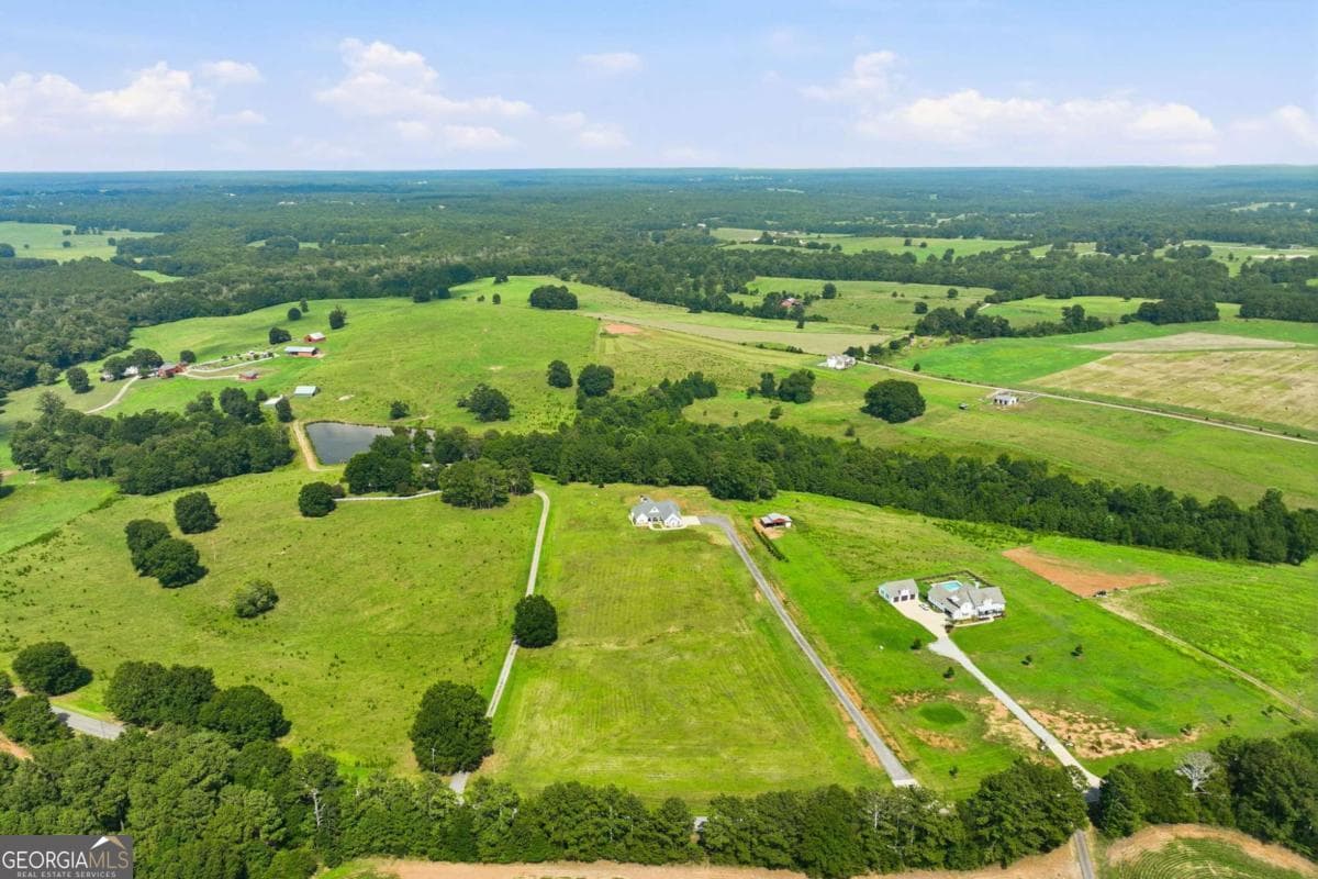 4 bedroom, 3.5 bathroom, 3,102 sq ft single family residence for sale at 5631 Sandy Creek Road, Madison, GA 30650 — photo 9