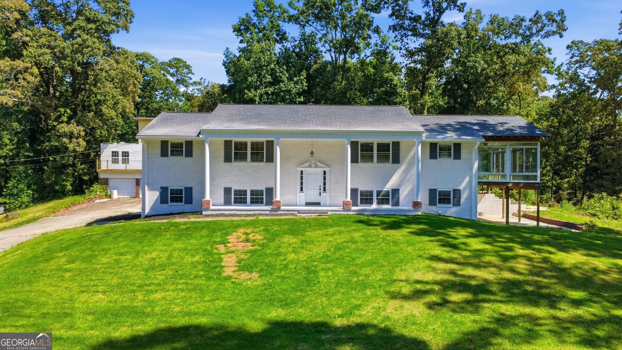 5 bedroom, 4 bathroom, 4,746 sq ft single family residence for sale at 3257 S Bay Drive, Jonesboro, GA 30236 — photo 1 of 36