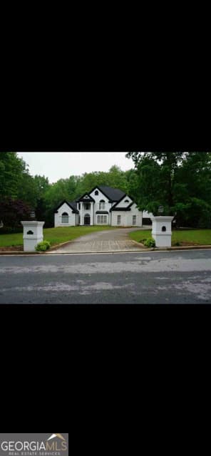 6 bedroom, 6.5 bathroom, 10,288 sq ft single family residence for sale at 2173 Spencers Way, Stone Mountain, GA 30087