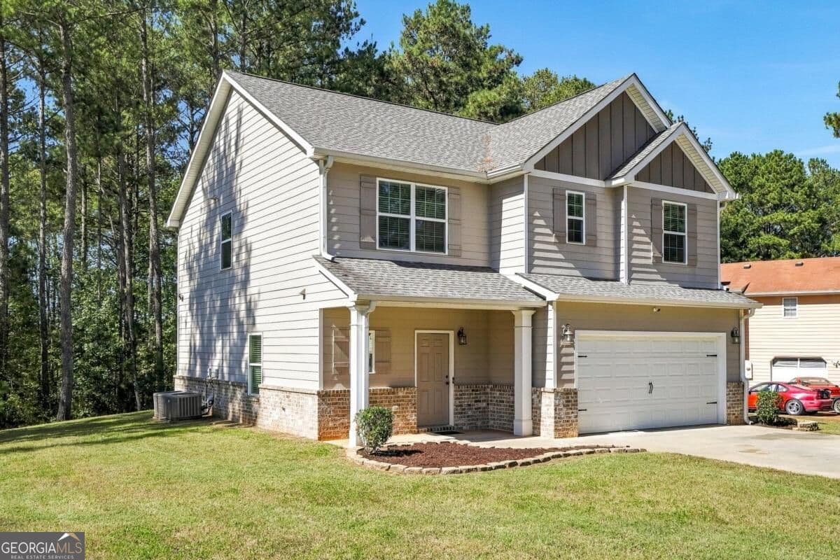 4 bedroom, 2.5 bathroom single family residence for sale at 601 Monticello Lane, Mcdonough, GA 30253 — photo 2
