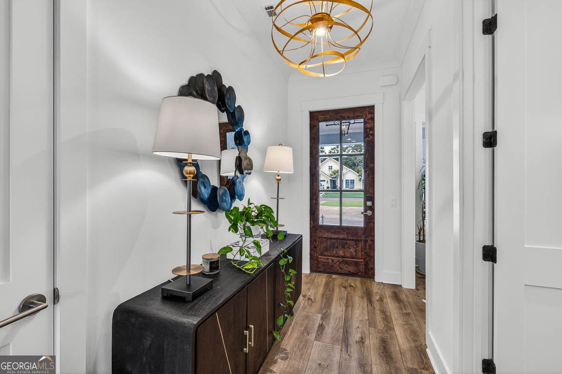 6 bedroom, 5.5 bathroom, 4,350 sq ft single family residence for sale at 28 Orchard Road, St. Simons, GA 31522 — photo 5