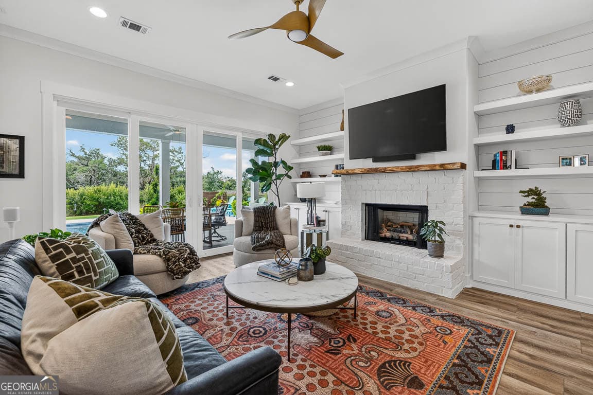6 bedroom, 5.5 bathroom, 4,350 sq ft single family residence for sale at 28 Orchard Road, St. Simons, GA 31522 — photo 8