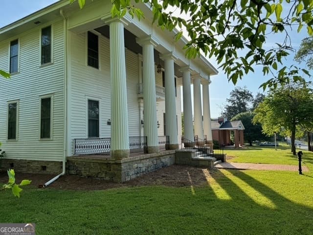 5 bedroom, 2.5 bathroom, 4,697 sq ft single family residence for sale at 222 W Church Street, Lexington, GA 30648 — photo 2