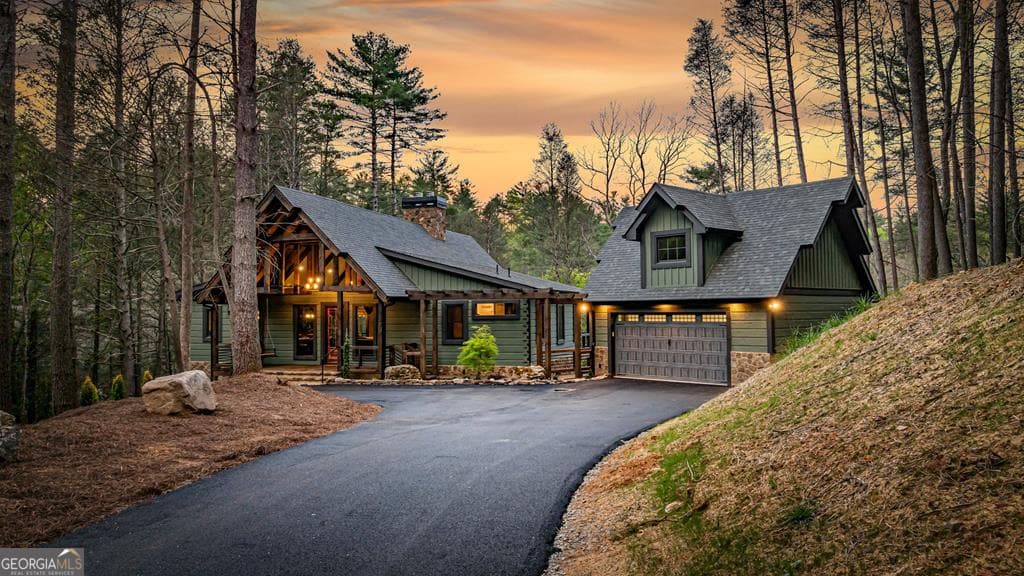 3 bedroom, 3.5 bathroom, 3,584 sq ft cabin,single family residence sold at 138 River Road, Cherry Log, GA 30522