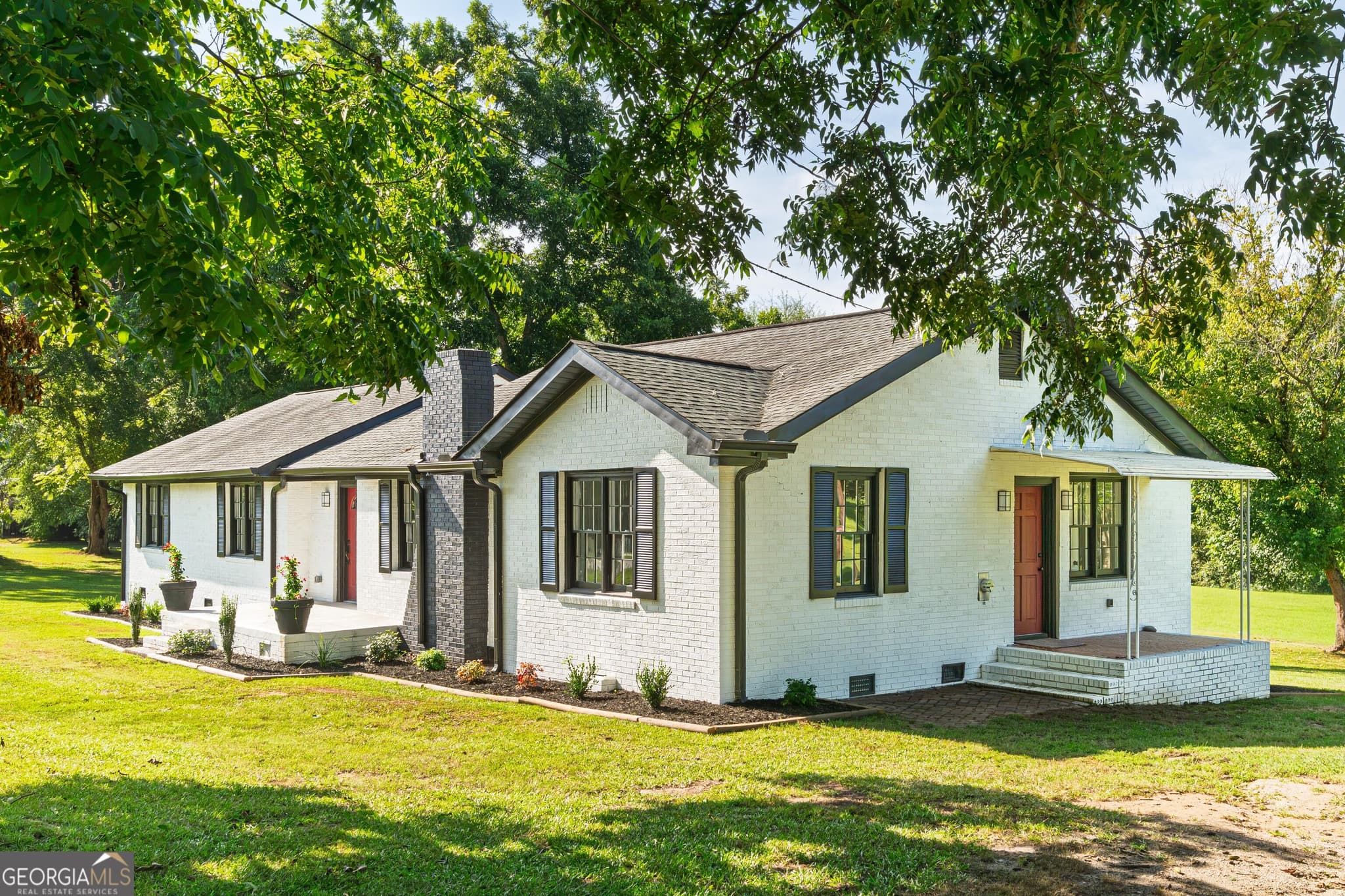 4 bedroom, 3 bathroom, 2,202 sq ft single family residence for sale at 418 Lamb Road, Moreland, GA 30259 — photo 2