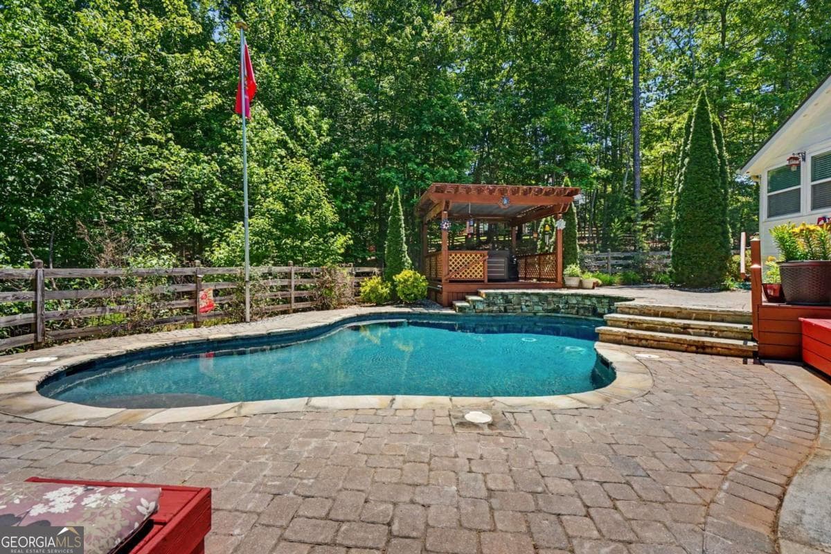 7 bedroom, 4.5 bathroom, 4,651 sq ft single family residence for sale at 52 White Oak Trail, Dahlonega, GA 30533 — photo 3