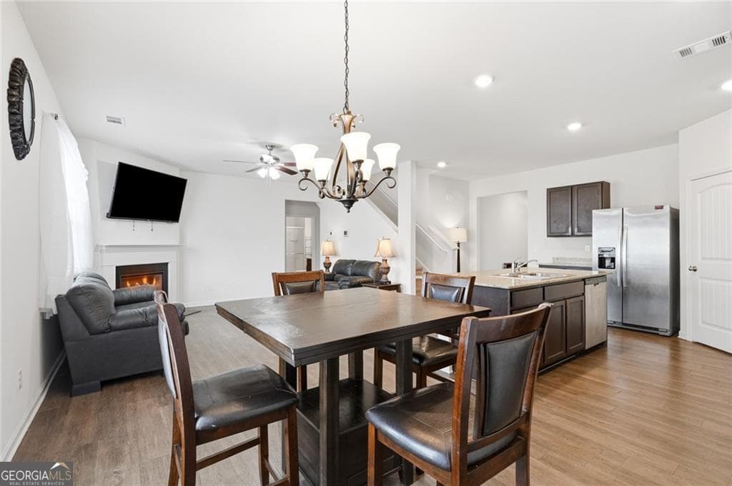 5 bedroom, 3.5 bathroom, 2,648 sq ft single family residence for sale at 5396 Pennington Court, Atlanta, GA 30349 — photo 2