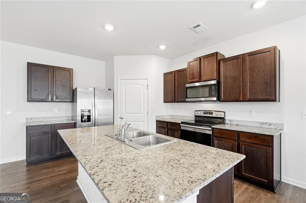 5 bedroom, 3.5 bathroom, 2,648 sq ft single family residence for sale at 5396 Pennington Court, Atlanta, GA 30349 — photo 6