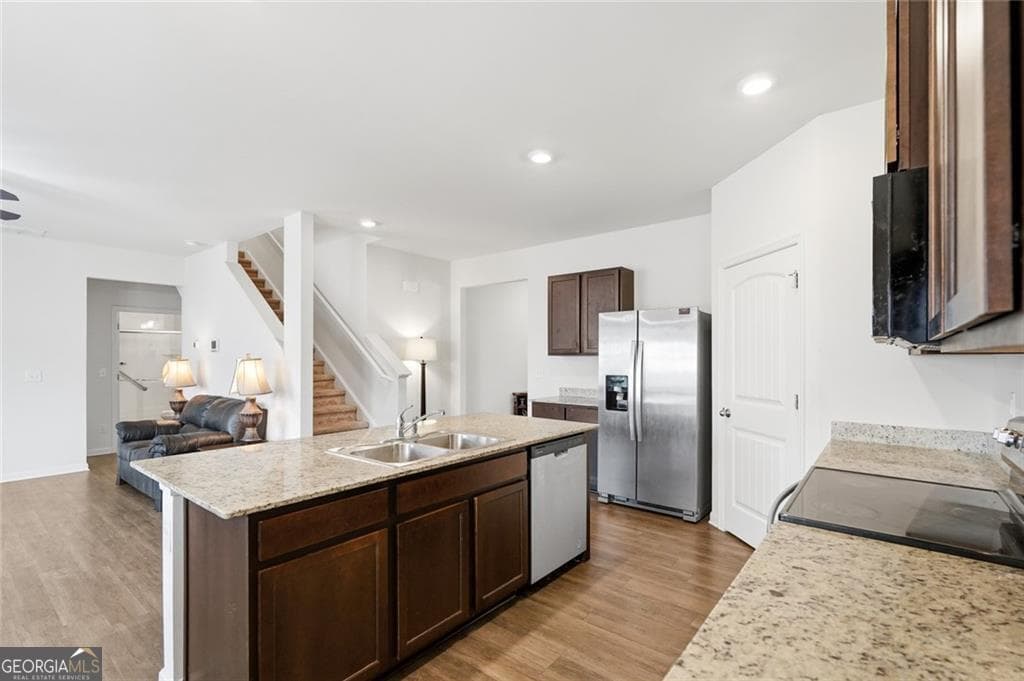 5 bedroom, 3.5 bathroom, 2,648 sq ft single family residence for sale at 5396 Pennington Court, Atlanta, GA 30349 — photo 7