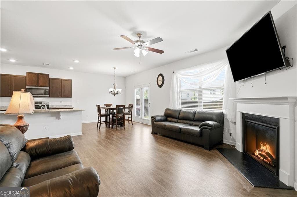 5 bedroom, 3.5 bathroom, 2,648 sq ft single family residence for sale at 5396 Pennington Court, Atlanta, GA 30349 — photo 4