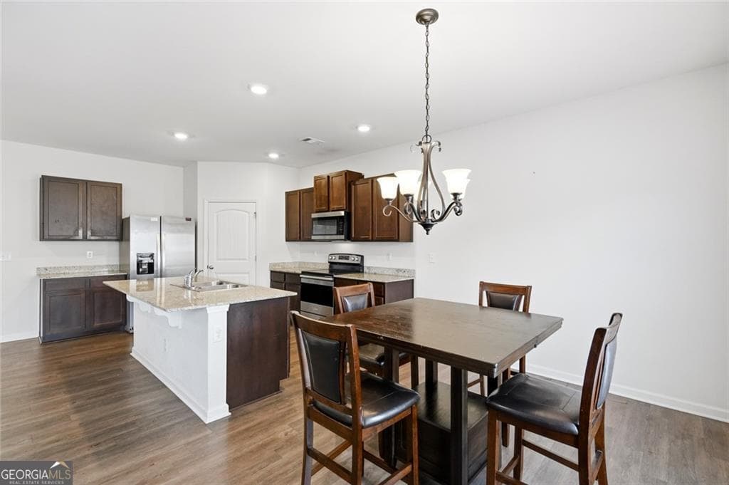 5 bedroom, 3.5 bathroom, 2,648 sq ft single family residence for sale at 5396 Pennington Court, Atlanta, GA 30349 — photo 8