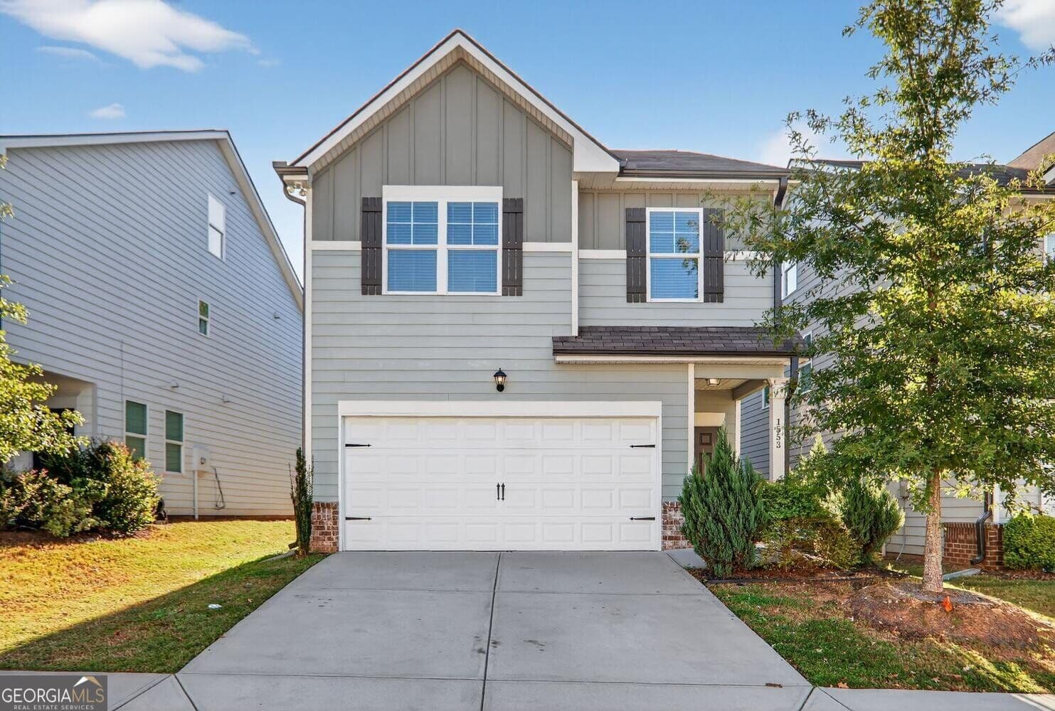 4 bedroom, 3.5 bathroom, 2,557 sq ft single family residence for sale at 1553 Spring Hollow Way, Stone Mountain, GA 30083