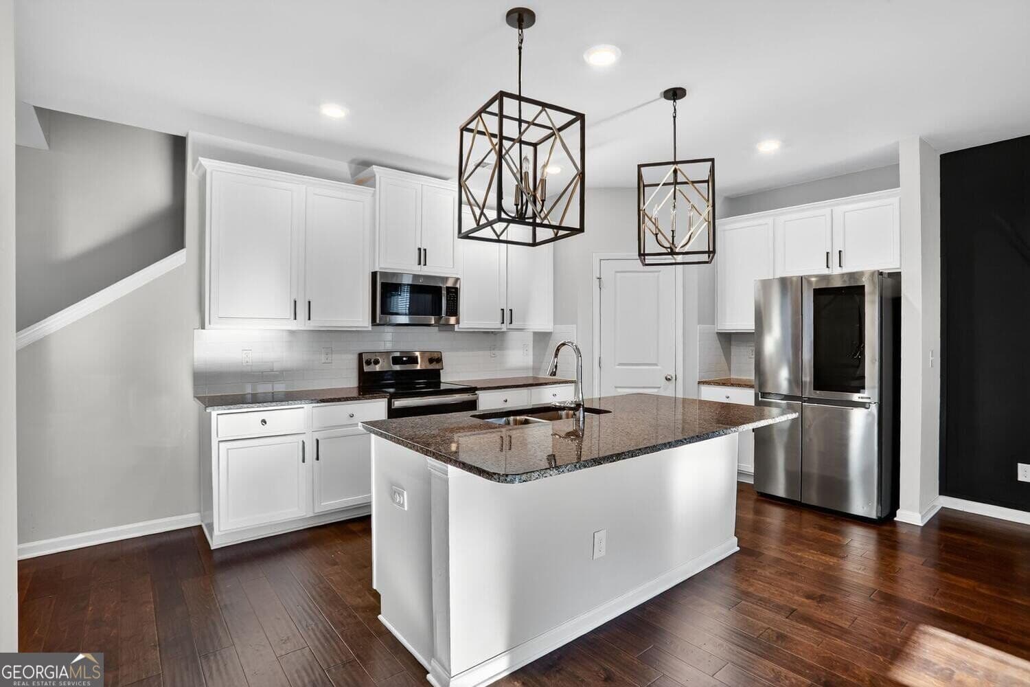 4 bedroom, 3.5 bathroom, 2,557 sq ft single family residence for sale at 1553 Spring Hollow Way, Stone Mountain, GA 30083 — photo 5