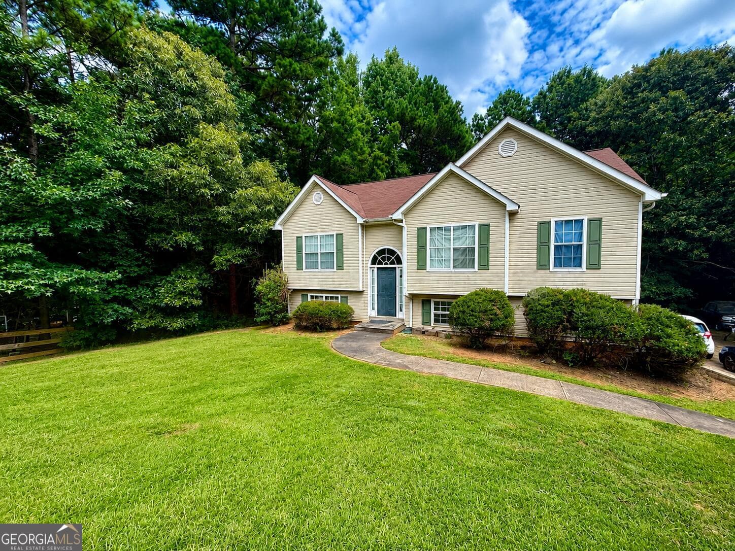 4 bedroom, 3 bathroom, 1,460 sq ft single family residence for sale at 129 Hampton Brook Drive, Hampton, GA 30228 — photo 1 of 15