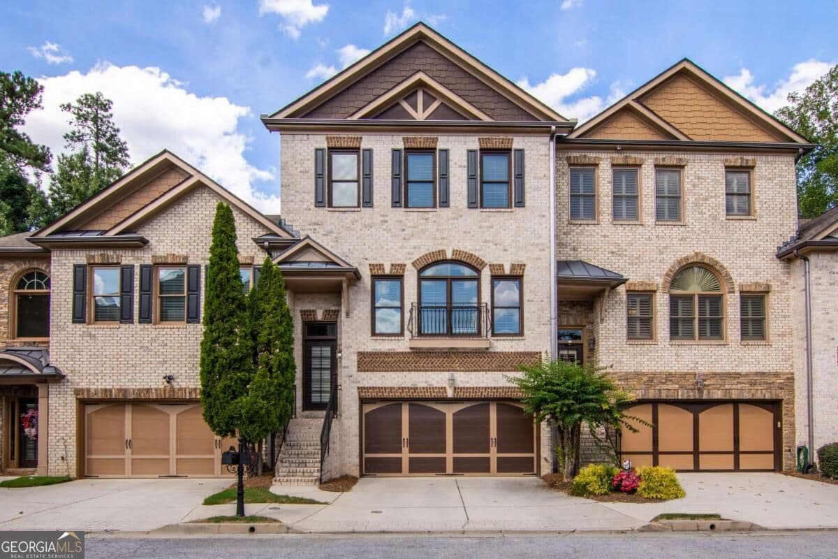 3 bedroom, 3.5 bathroom, 2,900 sq ft townhouse for sale at 1154 Water Grass Way, Lawrenceville, GA 30045 — photo 1 of 42