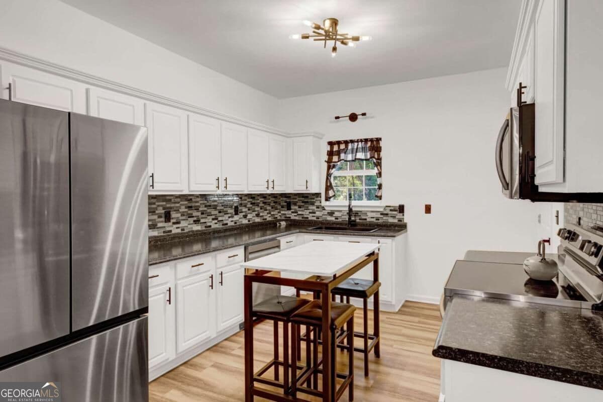 3 bedroom, 2.5 bathroom, 1,624 sq ft single family residence for sale at 2810 Imperial Drive, Cumming, GA 30041 — photo 8