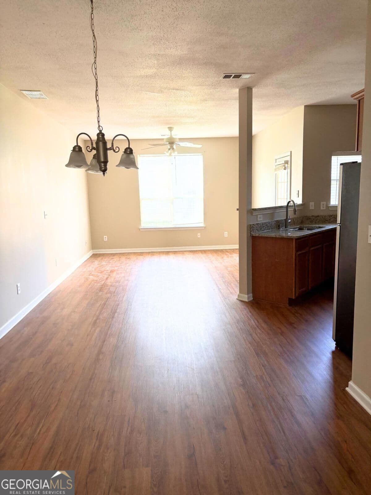 3 bedroom, 2.5 bathroom, 1,608 sq ft townhouse for sale at 11315 Michelle Way, Hampton, GA 30228 — photo 2
