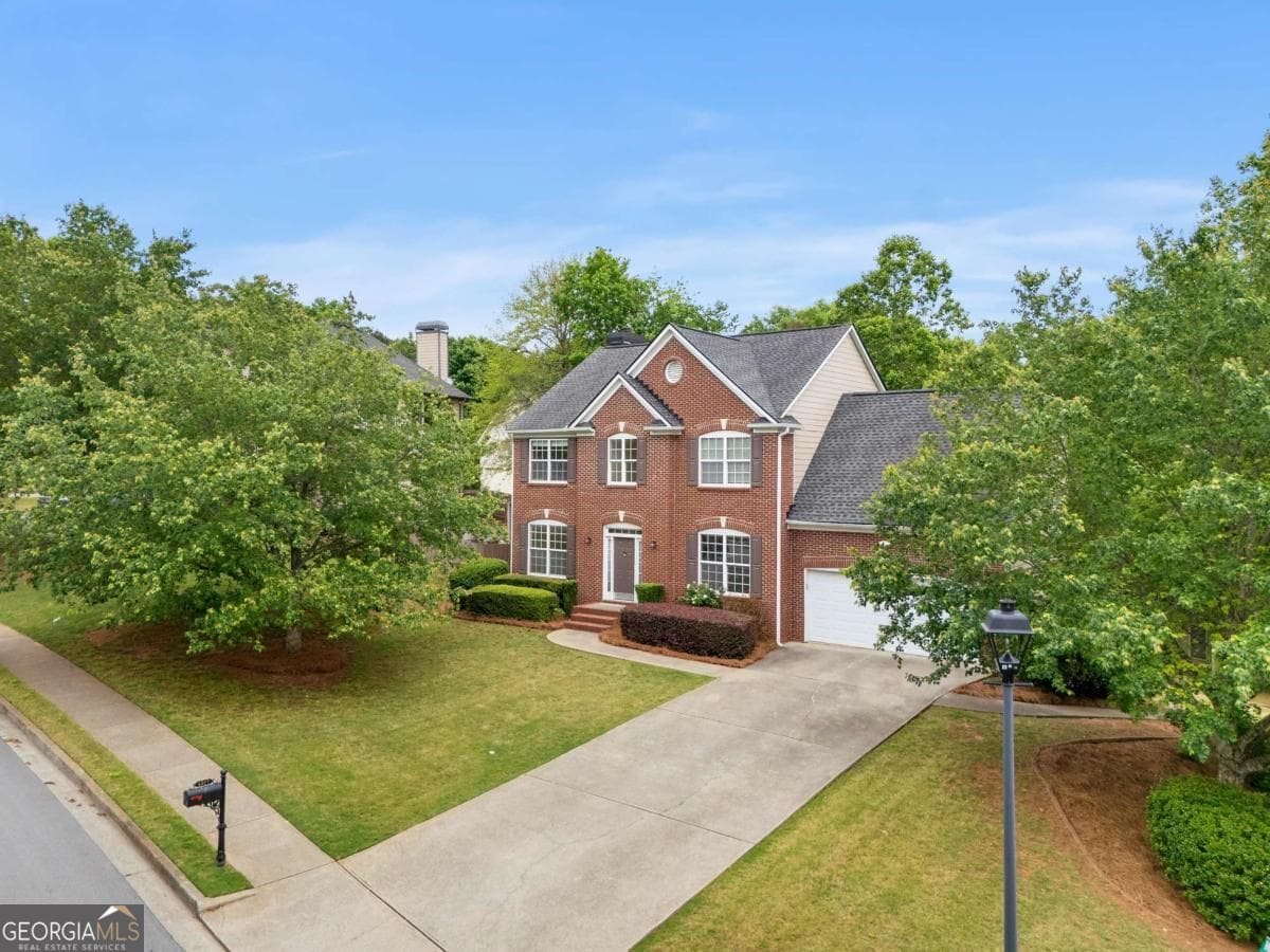 5 bedroom, 3 bathroom, 2,532 sq ft single family residence for sale at 4017 Wyndam Hill Drive, Suwanee, GA 30024 — photo 2