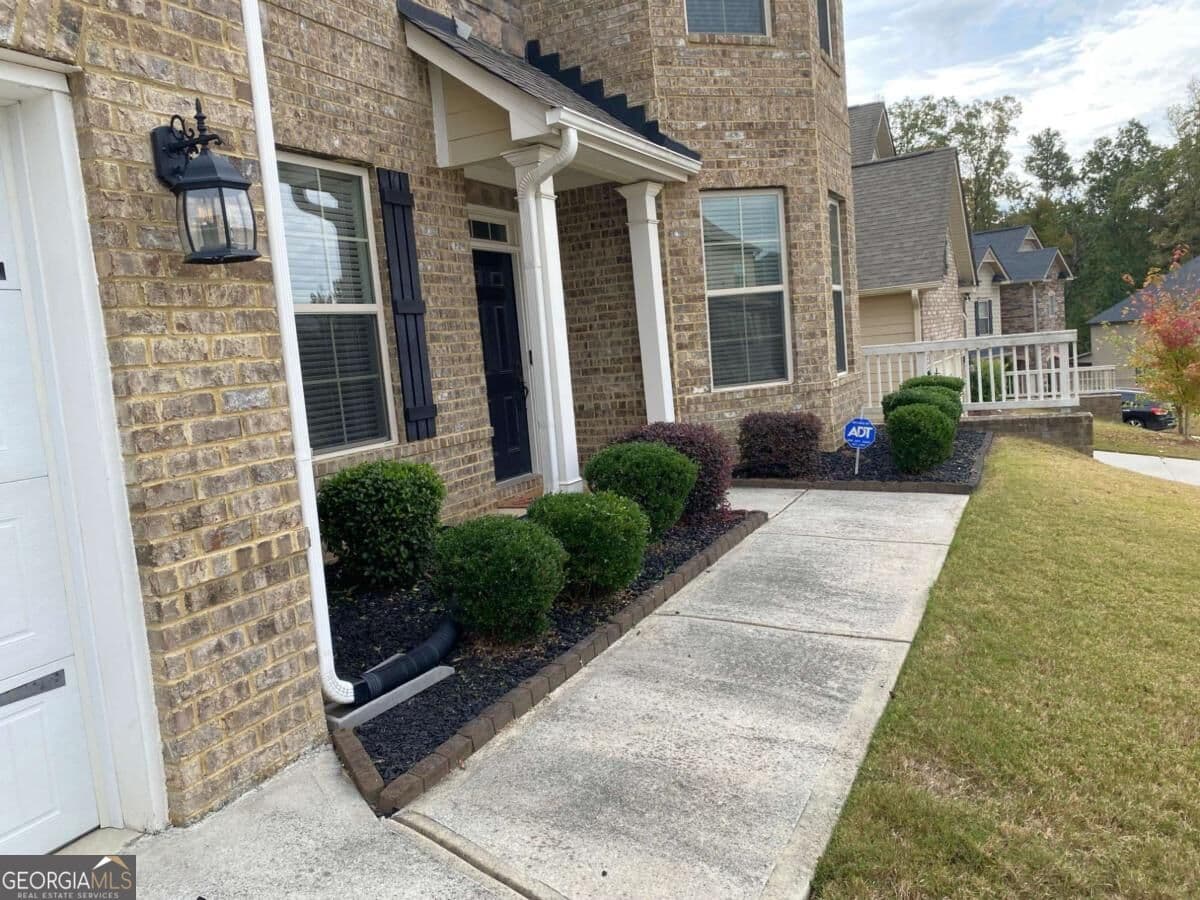 6 bedroom, 4 bathroom, 4,296 sq ft single family residence for sale at 4806 RALIN Court, Atlanta, GA 30331 — photo 2