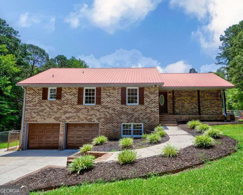 4 bedroom, 3 bathroom, 2,407 sq ft single family residence for sale at 1201 Pleasant Hill Road, Bogart, GA 30622 — photo 2