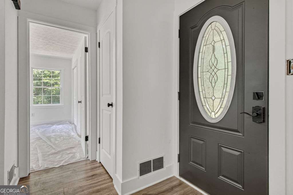 4 bedroom, 3 bathroom, 2,407 sq ft single family residence for sale at 1201 Pleasant Hill Road, Bogart, GA 30622 — photo 3