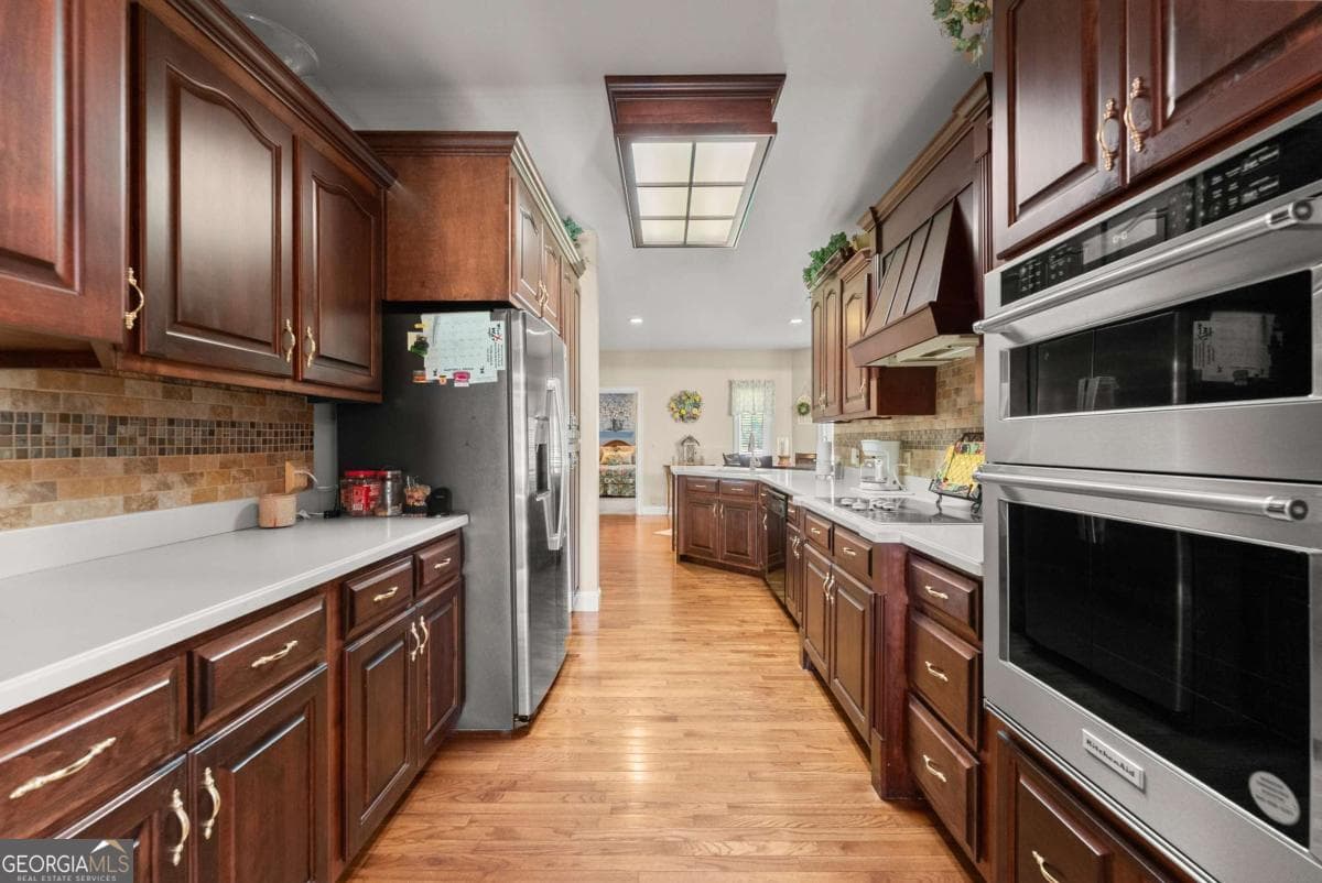 4 bedroom, 3 bathroom, 6,428 sq ft single family residence for sale at 1121 Beacon Light Road, Hartwell, GA 30643 — photo 4