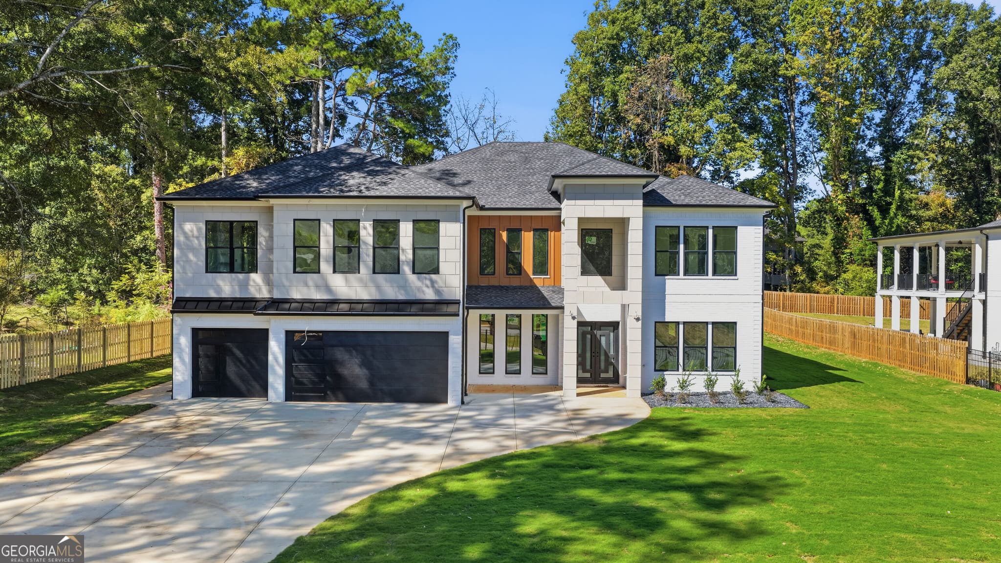 5 bedroom, 6 bathroom, 7,000 sq ft single family residence for sale at 2227 Five Forks Trickum Road, Lawrenceville, GA 30044 — photo 3