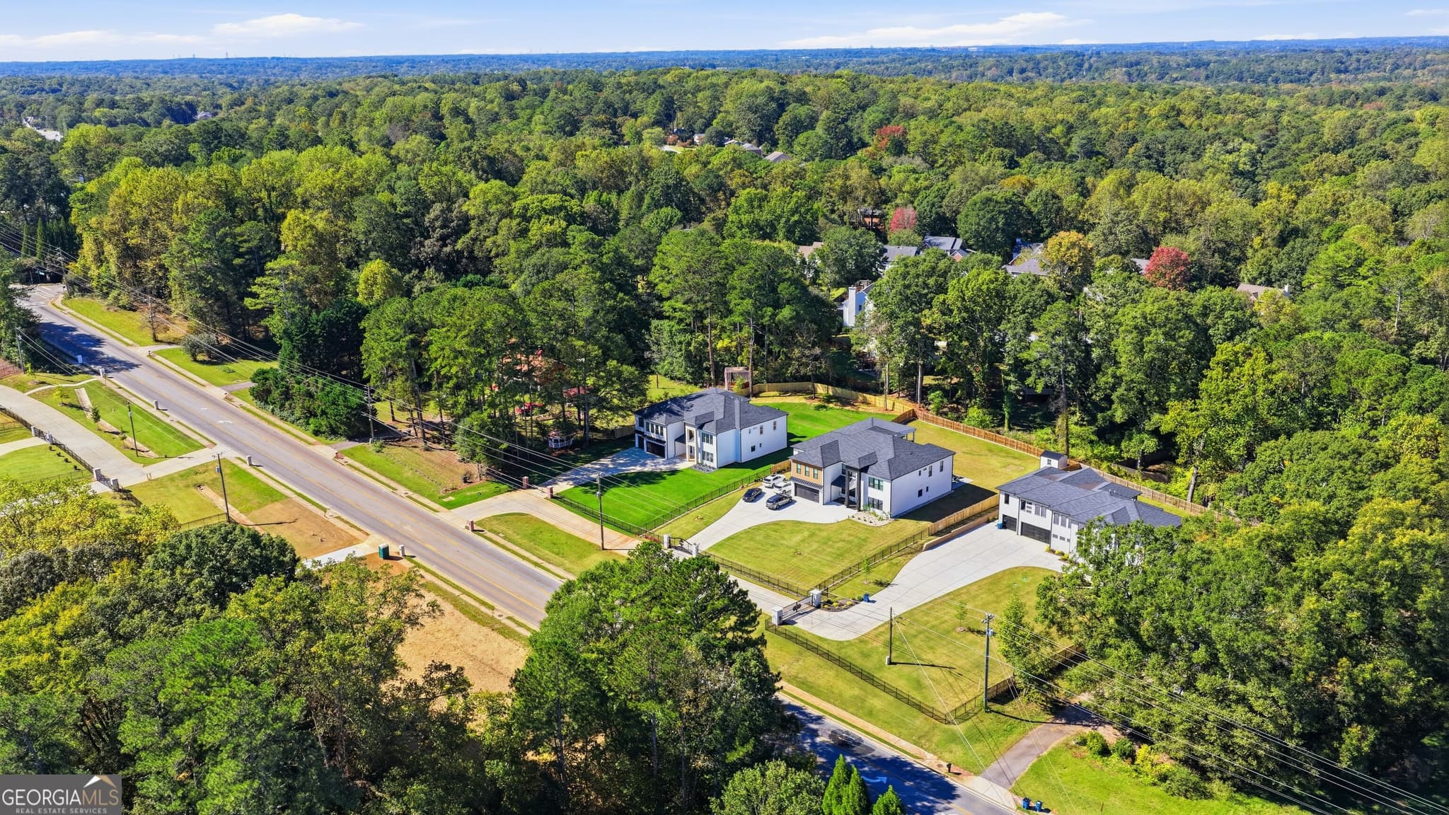 5 bedroom, 6 bathroom, 7,000 sq ft single family residence for sale at 2227 Five Forks Trickum Road, Lawrenceville, GA 30044 — photo 5