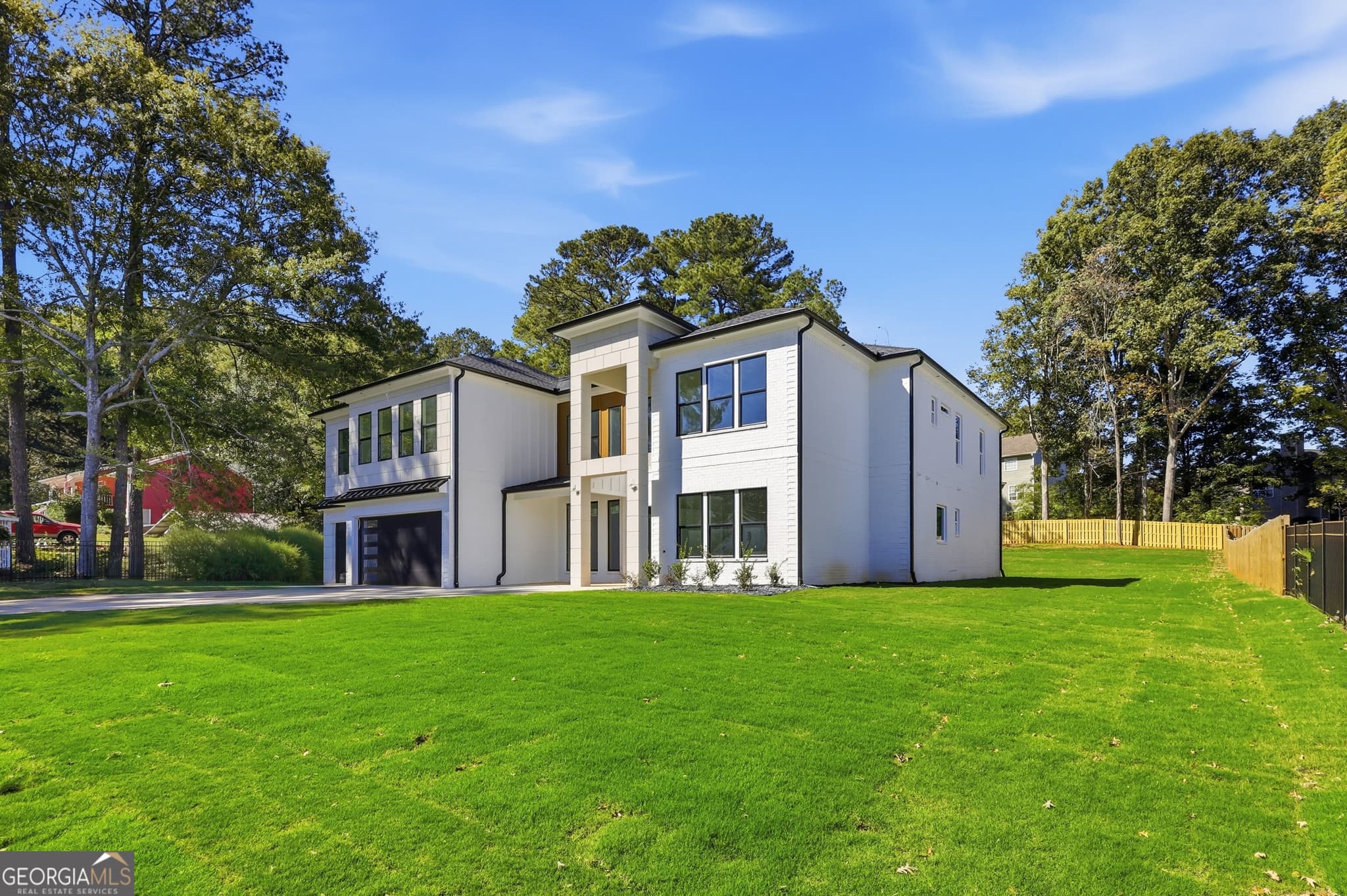 5 bedroom, 6 bathroom, 7,000 sq ft single family residence for sale at 2227 Five Forks Trickum Road, Lawrenceville, GA 30044 — photo 4