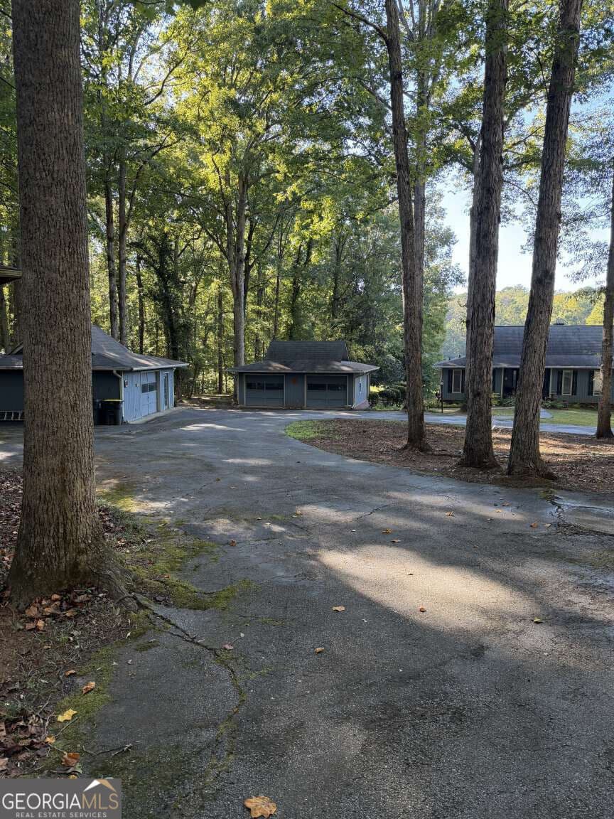 3 bedroom, 4 bathroom, 4,710 sq ft single family residence for sale at 100 Brookshire Drive, Fayetteville, GA 30215 — photo 2